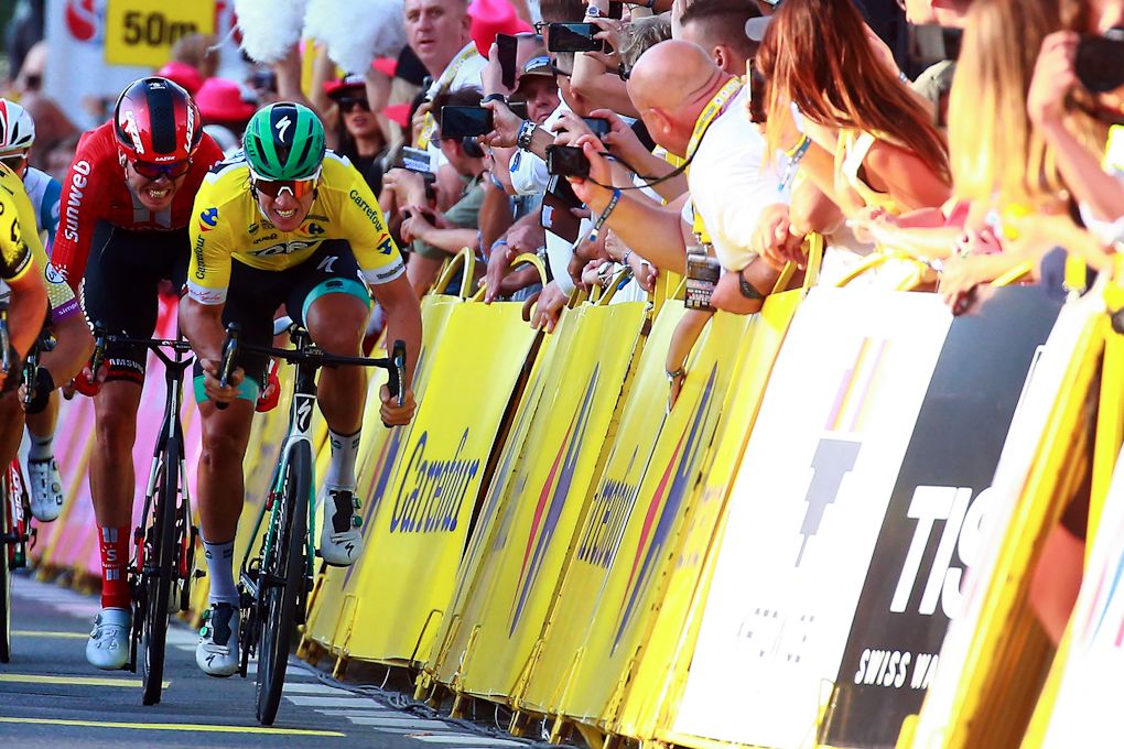 Pascal Ackermann sprints along the barriers during stage 2 at the Tour de Pologne