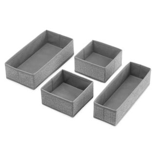 Several gray fabric drawer organizers