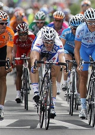Wouter Weylandt (Quick Step) throws his bike to take victory.