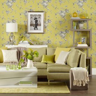 living room with floral print wallpaper and wooden flooring