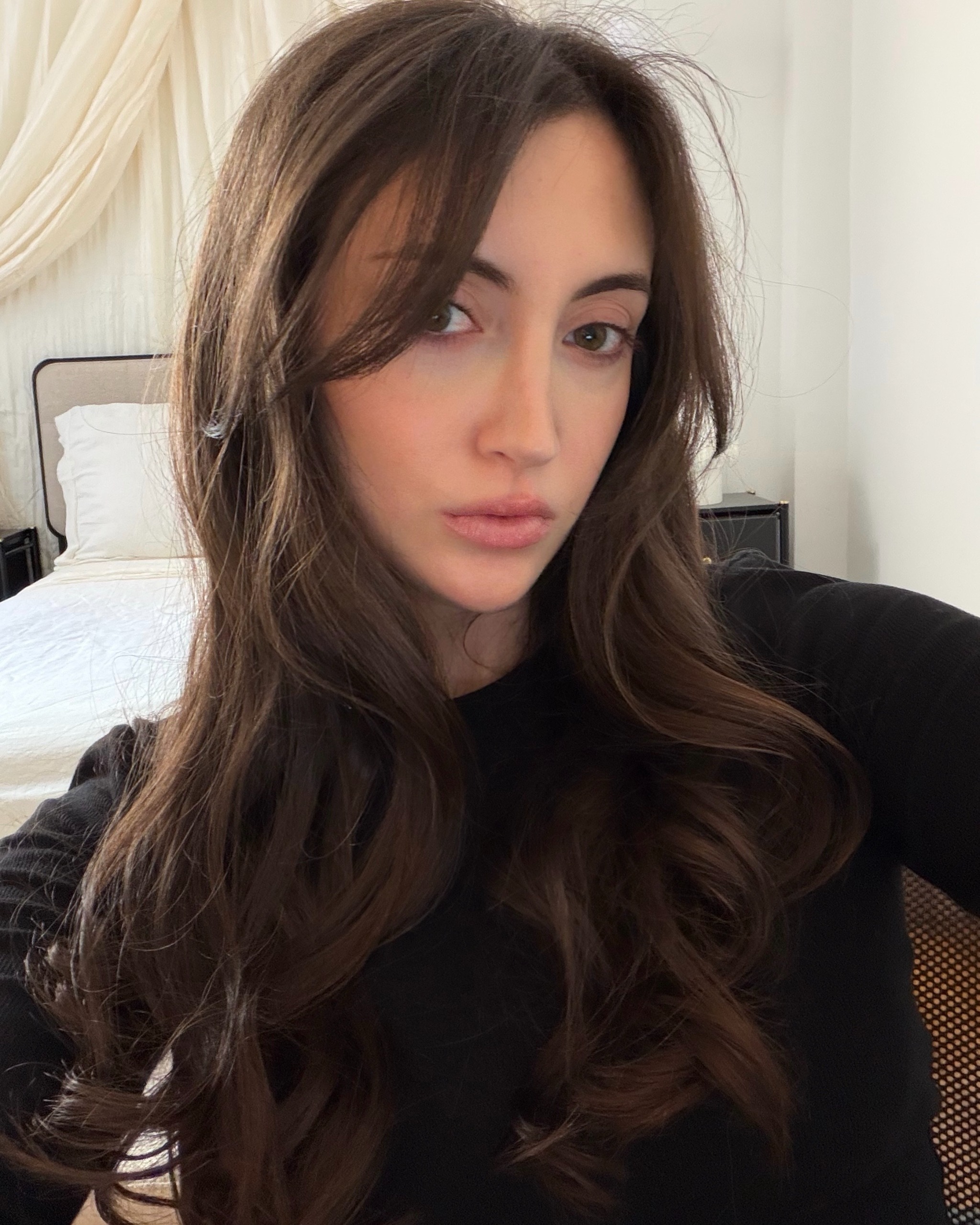 WWW associate beauty editor Alyssa Brascia's hair before cutting bangs like Daisy Edgar-Jones.