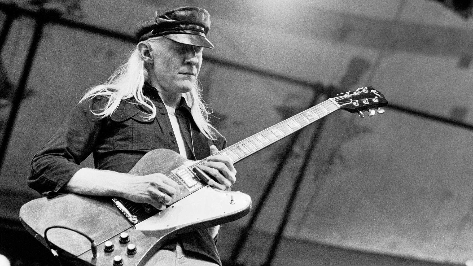 American Blues and Rock musician Johnny Winter (1944 - 2014) plays electric guitar as he performs onstage during the Dr Pepper Central Park Music Festival, New York, New York, July 30, 1980.
