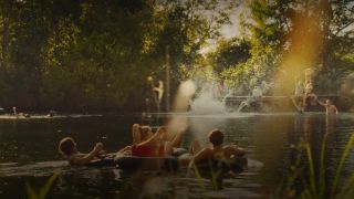 The Von Erich brothers tubing down a river in The Iron Claw