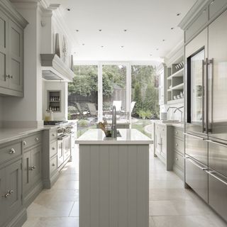 kitchen with grey and white coloured and storage drawers