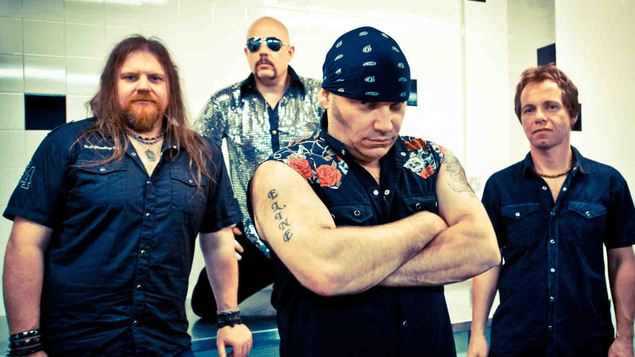 Wolfsbane posing for a photograph in 2018