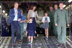 Prince William, Kate Middleton, Prince George, Princess Charlotte and Prince Louis walk down the ramp of a C17 place during their visit to the Air Tattoo at RAF Fairford on July 14, 2023 in Fairford, England