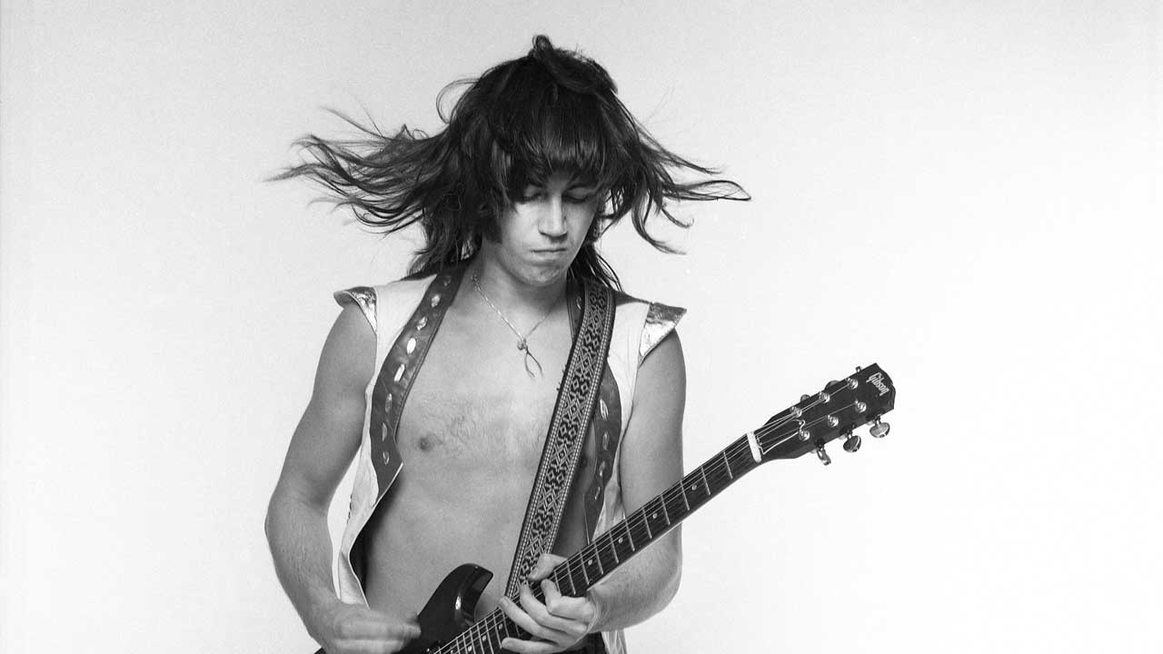Pat Travers with guitar, studio portrait