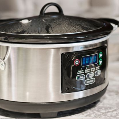 A heated slow cooker.