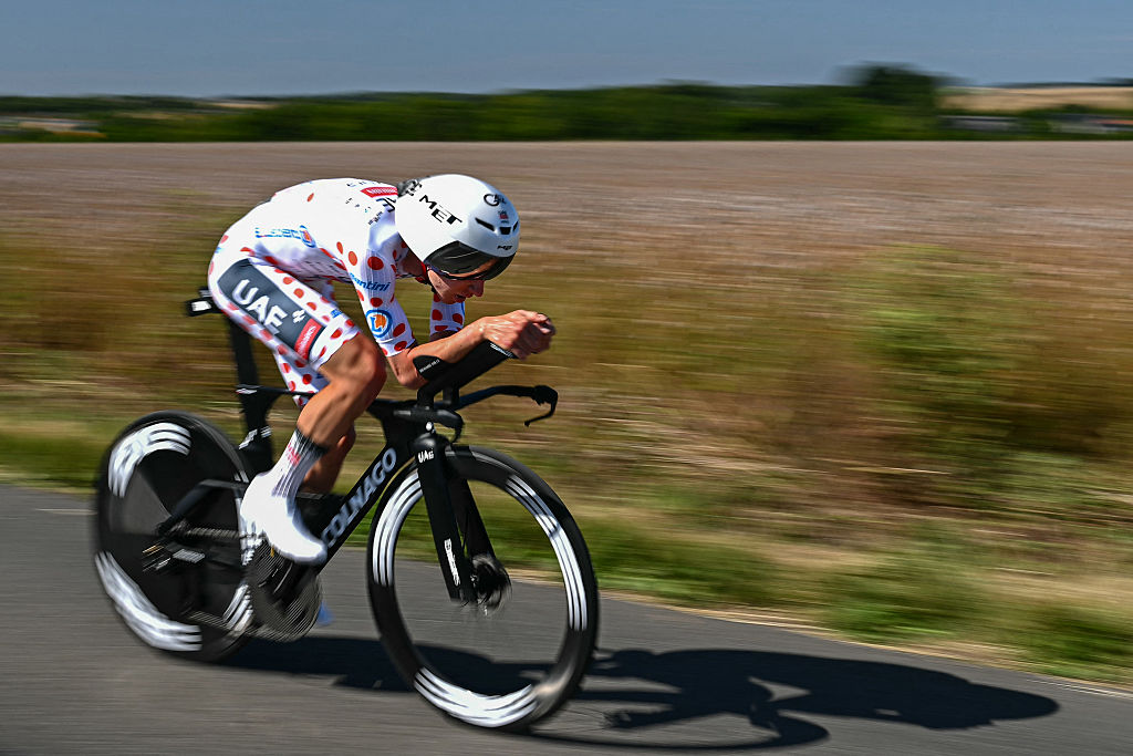UAE Team Emirate - XRG team's Slovenian rider Tadej Pogacar wearing the best climber's polka dot (dotted) jersey cycles during the 5th stage of the 112th edition of the Tour de France cycling race, 33 km individual time trial starting and finishing in Caen, northwestern France, on July 9, 2025. (Photo by Loic VENANCE / AFP) (Photo by LOIC VENANCE/AFP via Getty Images)