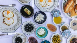 table loaded with dishes of Palestinian food from Bethlehem recipe book