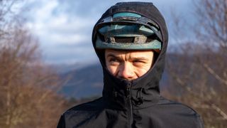 Canyon Softshell jacket on a man with the hood up