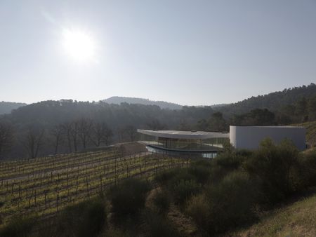 Niemeyer pavilion at chateau la coste seen among the green landscape