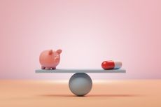 Conceptual image of a seesaw with a piggybank and an oversized pharmaceutical pill balancing on it, could illustrate ideas around cost, savings or inflation around medication