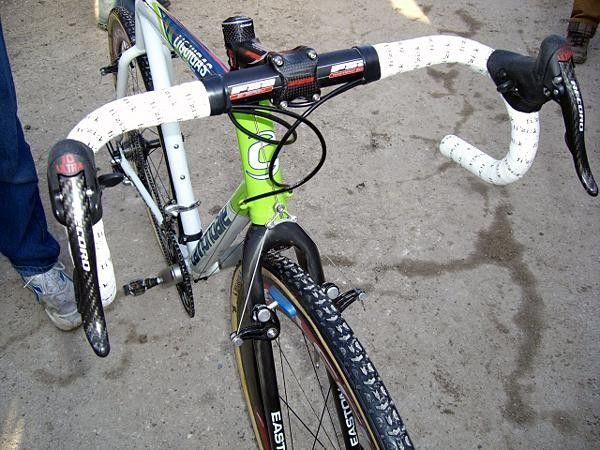 Campagnolo supplies Liquigas with its team-only levers, attached to a set of FSA handlebars and matching stem.