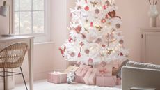white christmas tree with pink and red decorations