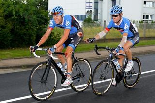 Ryder Hesjedal (Garmin-Sharp) and Tyler Farrar ride to the finish of stage 6 at the 2012 Tour de France.