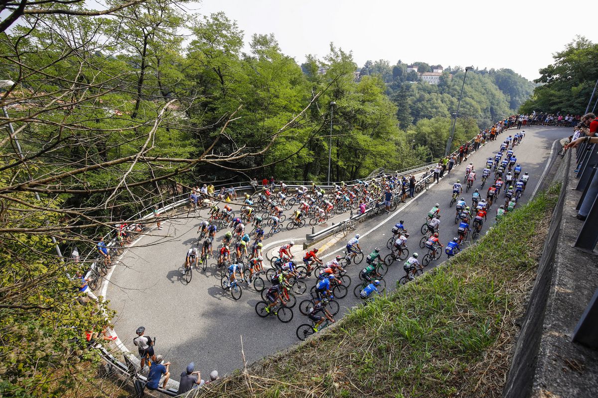 The riders head uphill