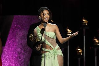Tyla accepts the "African Music Performance" award for "Water" onstage during the 66th GRAMMY Awards