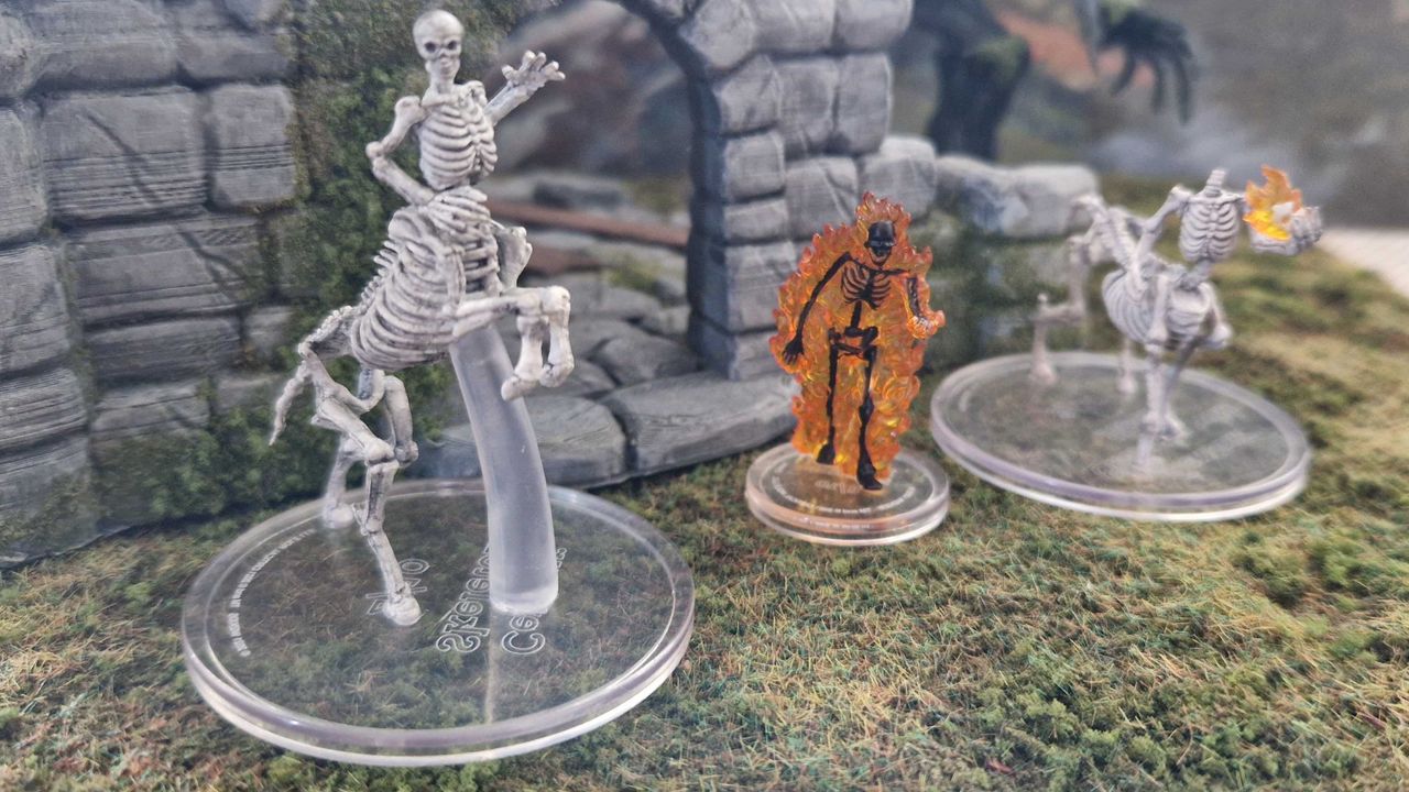 Centaur Skeletons and Flaming Skeleton from Critical Role Wave 2 - Monsters of Tal'Dorei (Set 2) in front of a ruined building