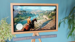 Custom all-in-one PC Steam Machine alternative with wood bezel and Red Dead Redemption 2 gameplay on screen.