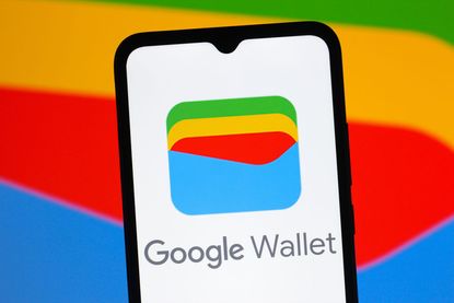 Google Wallet logo on cell phone screen