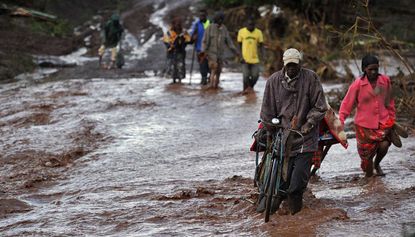 At least 47 people have been killed after a dam burst its banks in Kenya