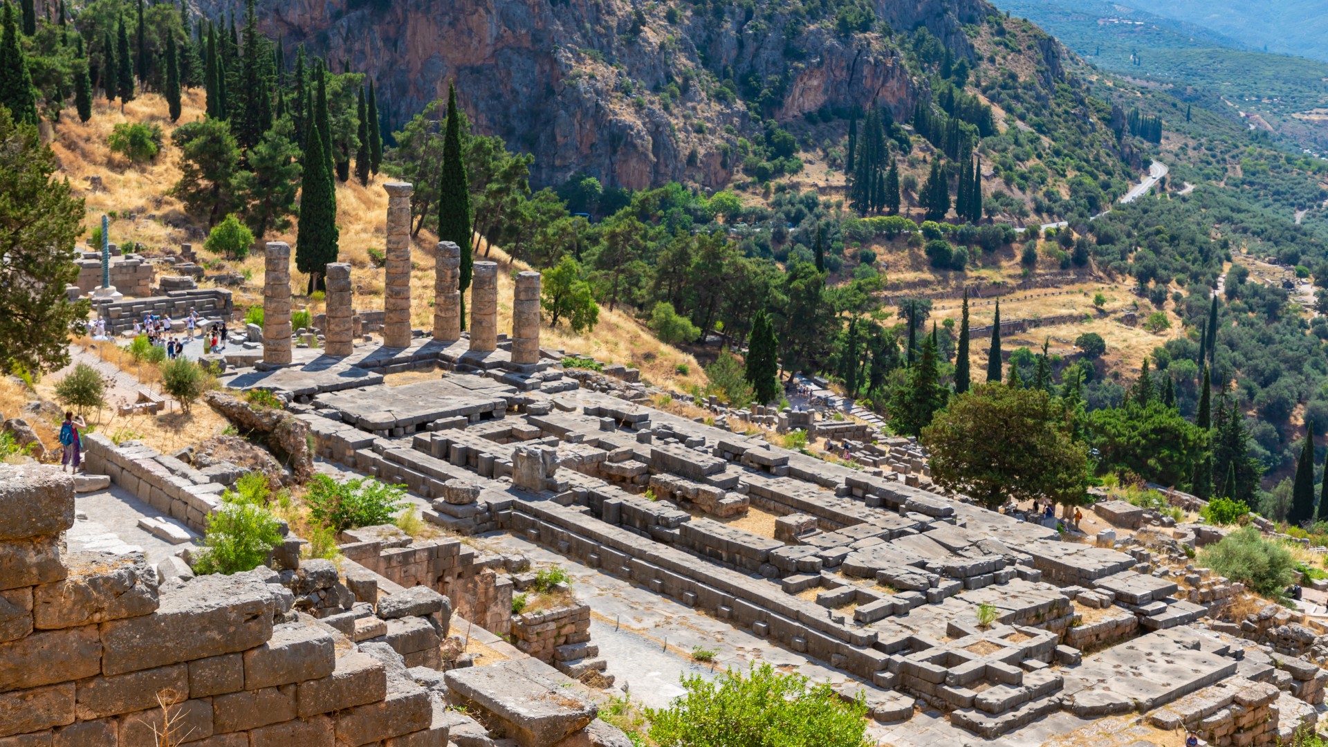 Apollo Temple in Delphi archaeological site at the Mount Parnassus. Delphi is famous by the oracle at the sanctuary dedicated to Apollo.