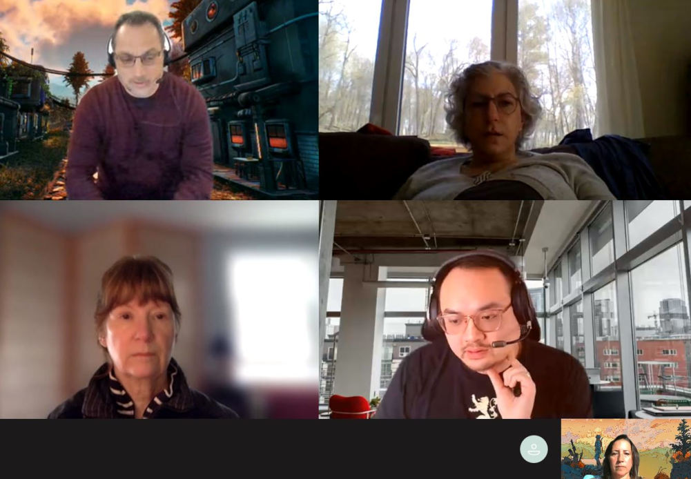Five members of videoconference on monitor