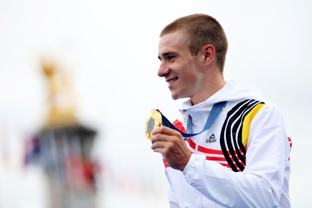 PARIS FRANCE JULY 27 Gold medalist Remco Evenepoel of Team Belgiumposes on the podium at the Pont Alexandre III during the Mens Individual Time Trial on day one of the Olympic Games Paris 2024 at Pont Alexandre III on July 27 2024 in Paris France Photo by Jared C TiltonGetty Images