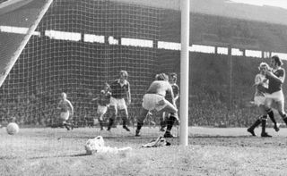 Denis Law scores for Manchester City against former club Manchester United in April 1974 as the Red Devils went on to be relegated.
