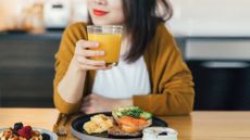 Woman eating for maximum nutritional absorption