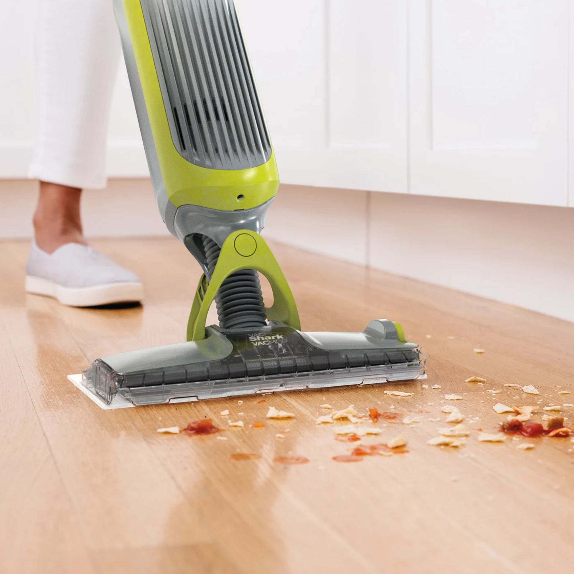 Using the Shark VacMop to clean dry debris off wooden floors