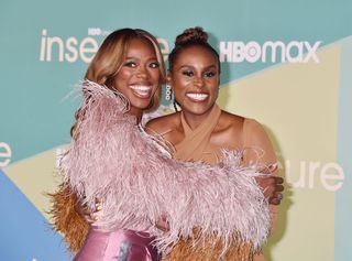 Yvonne Orji L and Issa Rae attend the Premiere of HBOs Insecure Season 5 at Kenneth Hahn Park on October 21 2021 i
