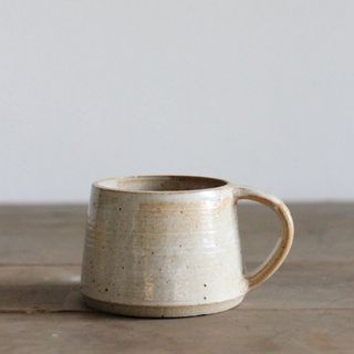Artisan mug in natural hues with speckles