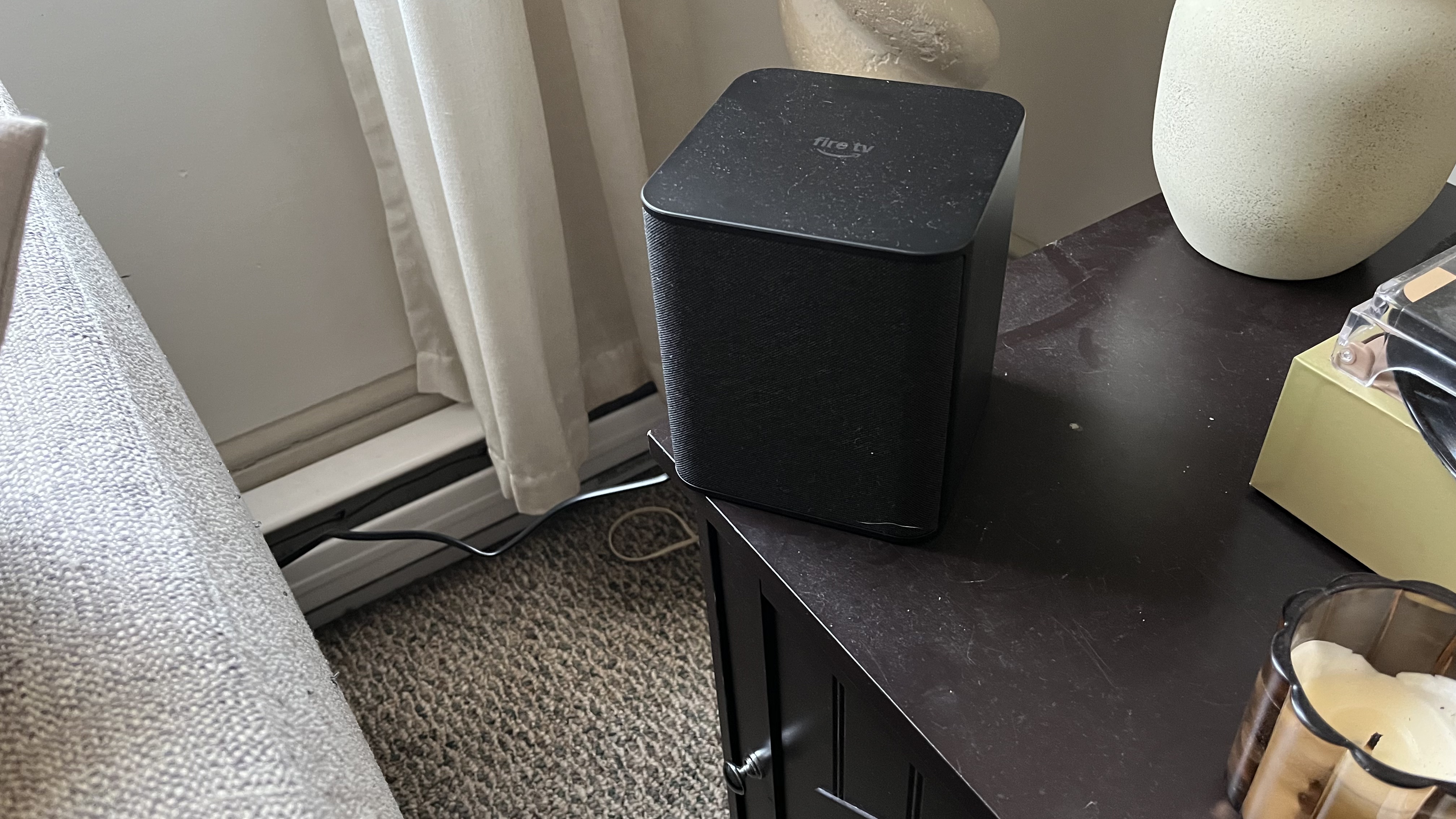 Amazon Fire TV Soundbar Plus rear speaker on table