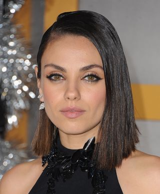 Actress Mila Kunis arrives at the Los Angeles Premiere of "A Bad Moms Christmas" at Regency Village Theatre on October 30, 2017 in Westwood, California.