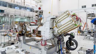 NASA's Perseverance Mars rover displaying where its MMRTG would be inserted, between the panels on the right marked by gold tube, before the power system was inserted.