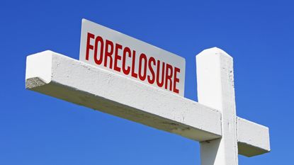 foreclosure sign for home equity theftt case