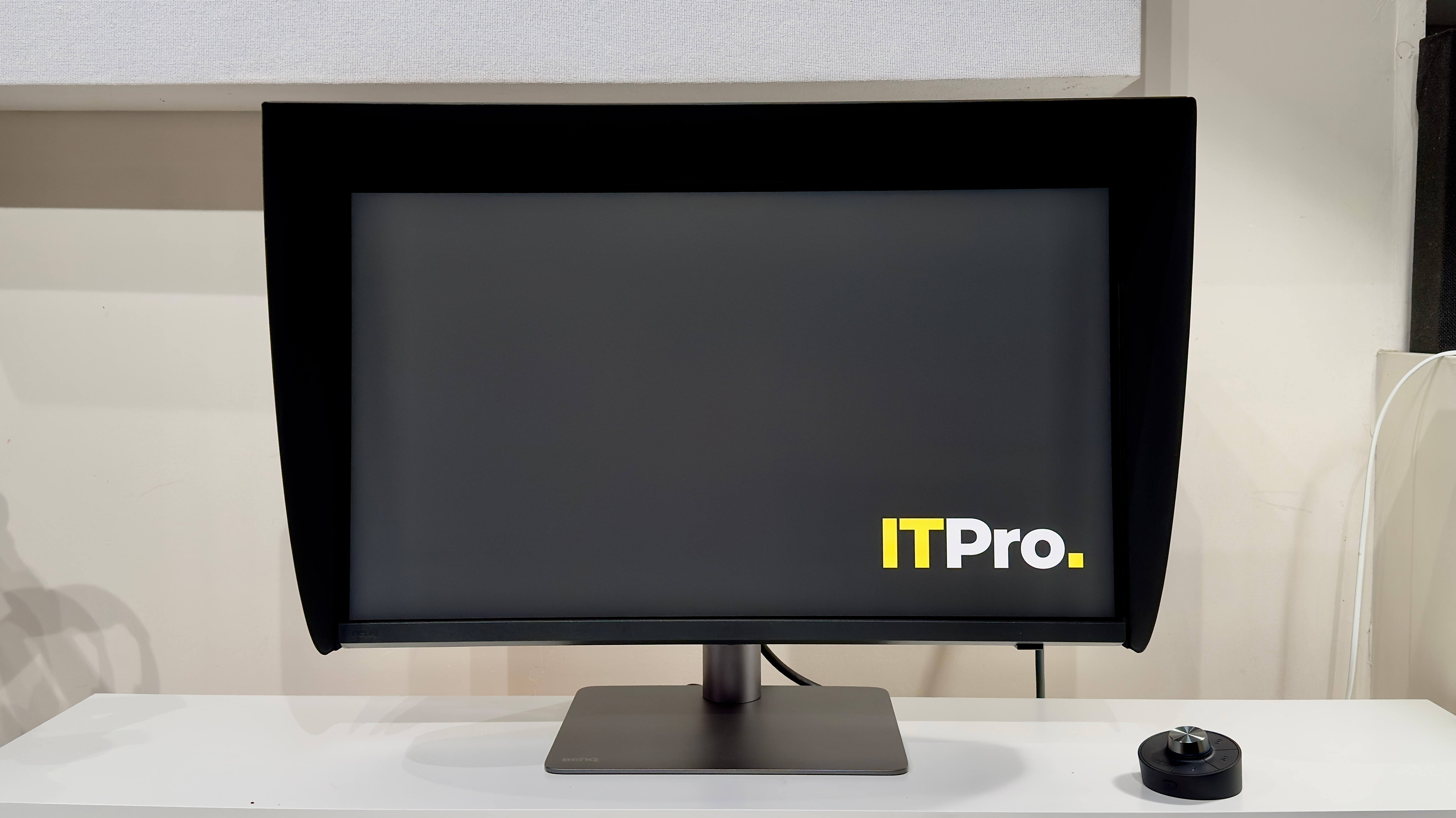 The BenQ PD2770U monitor on a desk