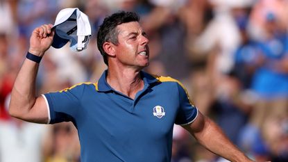 Rory McIlroy celebrates winning his Ryder Cup singles match