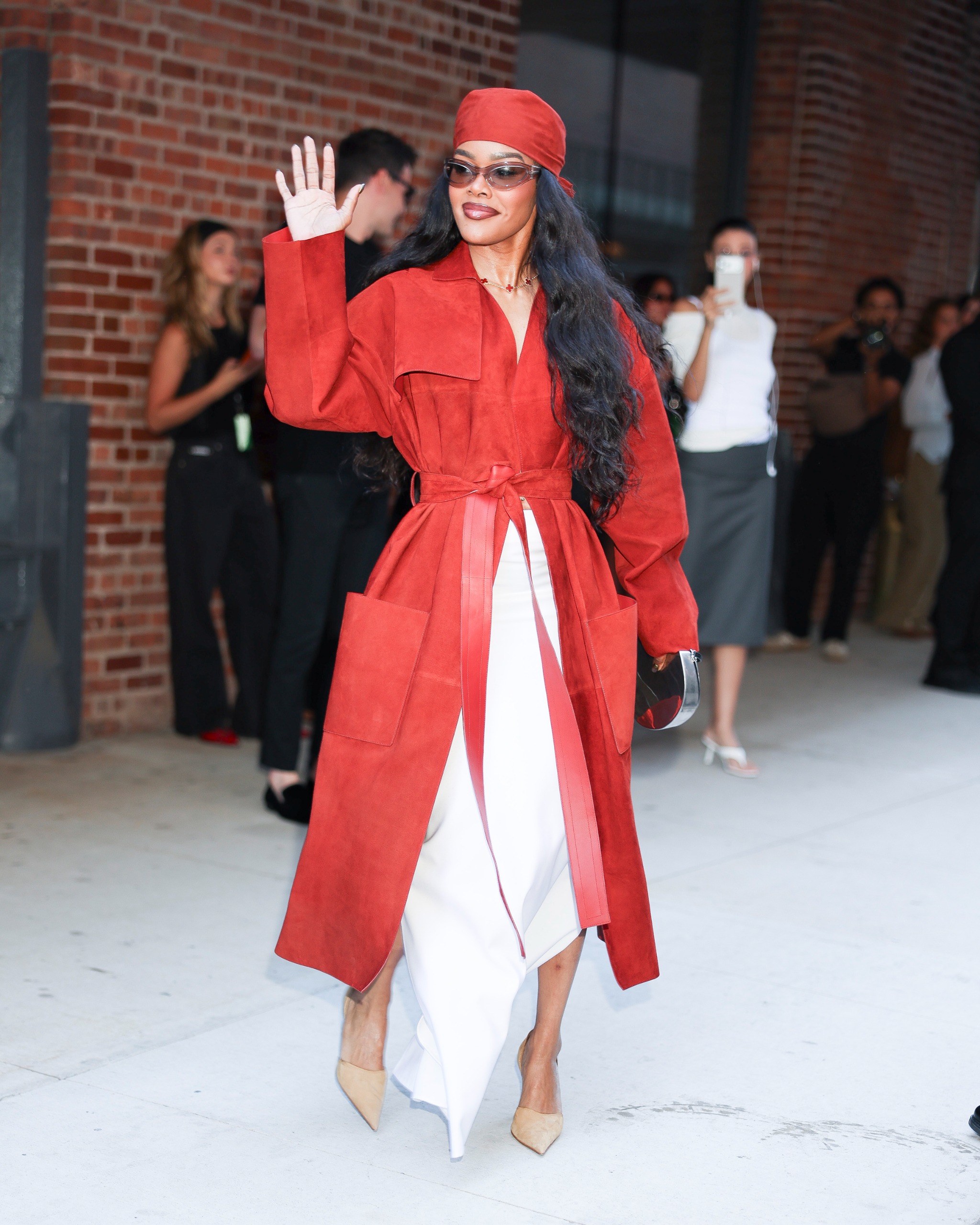 Teyana Taylor wore a red coat similar to Zo&amp;euml; Kravitz's at New York Fashion Week