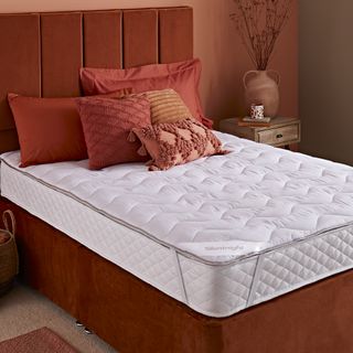 Silentnight Heat Genie self-heating mattress topper on bed