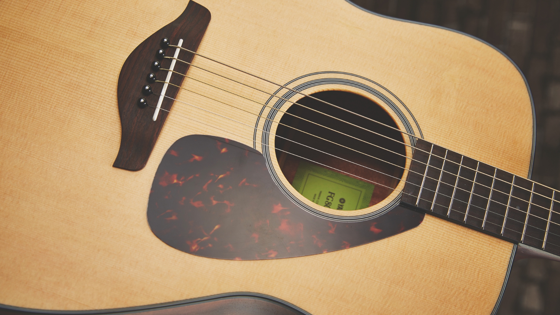 Close up of a Yamaha FG800 acoustic guitar