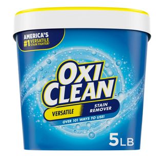 A blue tub of OxiClean with a white and yellow lid