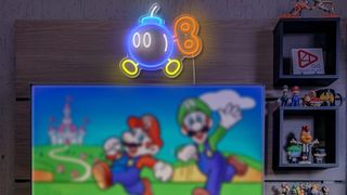 Mario inspired Bomb neon sign mounted on game room wall