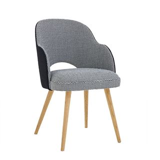 Benchmark Theda dining armchair with a monochrome checkmark pattern.