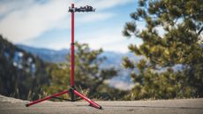 Feedback bike repair stand outside with a mountain backdrop