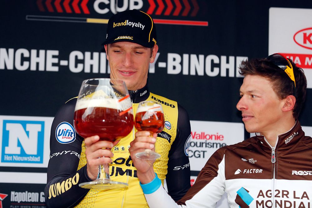 Danny van Poppel celebrates on the Binche-Chimay-Binche podium with Oliver Naesen