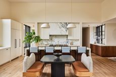 Californian kitchen ideas; kitchen with marble backsplash and wood cabinets by Sarah Sherman Samuel 