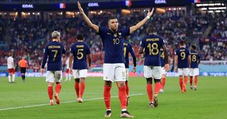Kylian Mbappe of France celebrates after scoring their team's first goal during the FIFA World Cup Qatar 2022 Group D match between France and Denmark at Stadium 974 on November 26, 2022 in Doha, Qatar. 